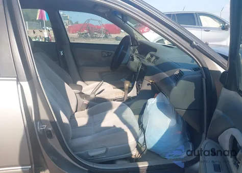 1999 Toyota Camry Le from USA, damaged, VIN 4T1BG22KXXU445889